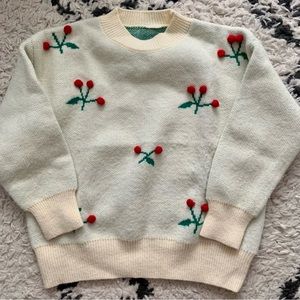 Warm and cozy cherry pom sweater. Size medium.